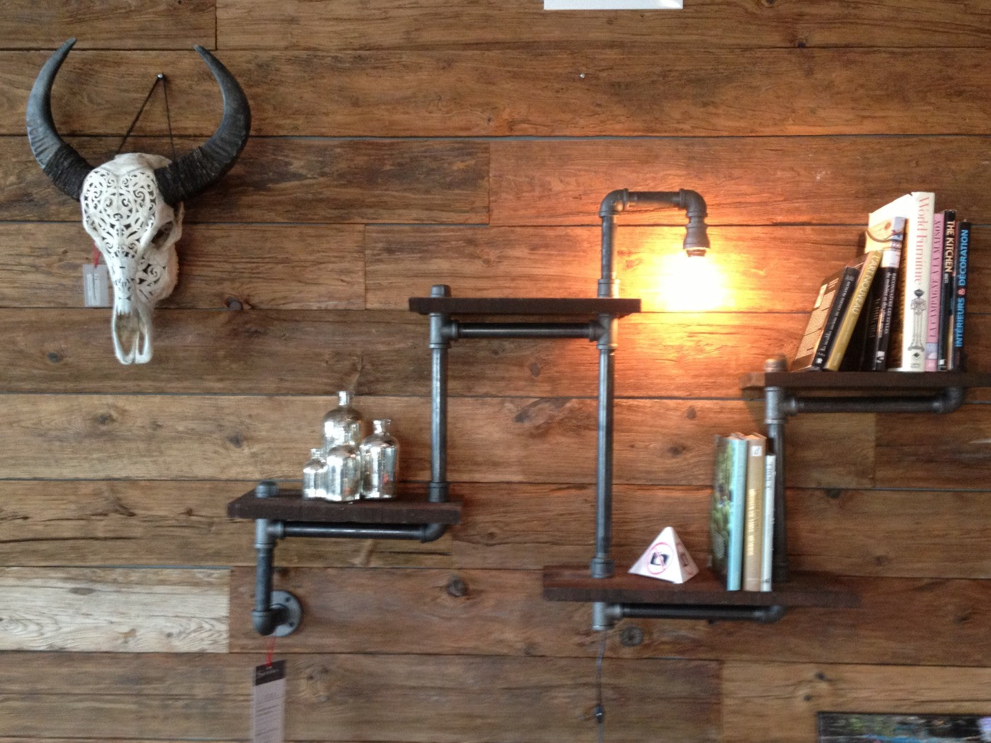 Rustic industrial wood wall shelf with iron pipes