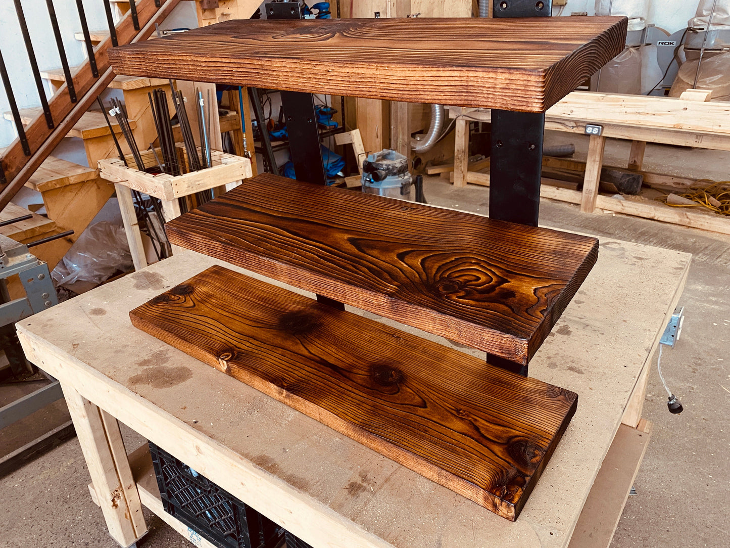 Reclaimed wood and iron wall bookshelf