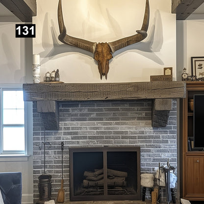 Custom reclaimed wood beam fireplace mantel with corbels