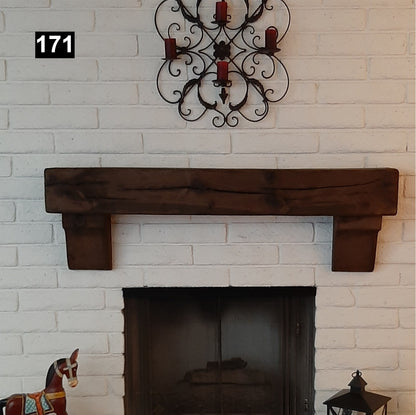 Custom reclaimed wood beam fireplace mantel with corbels
