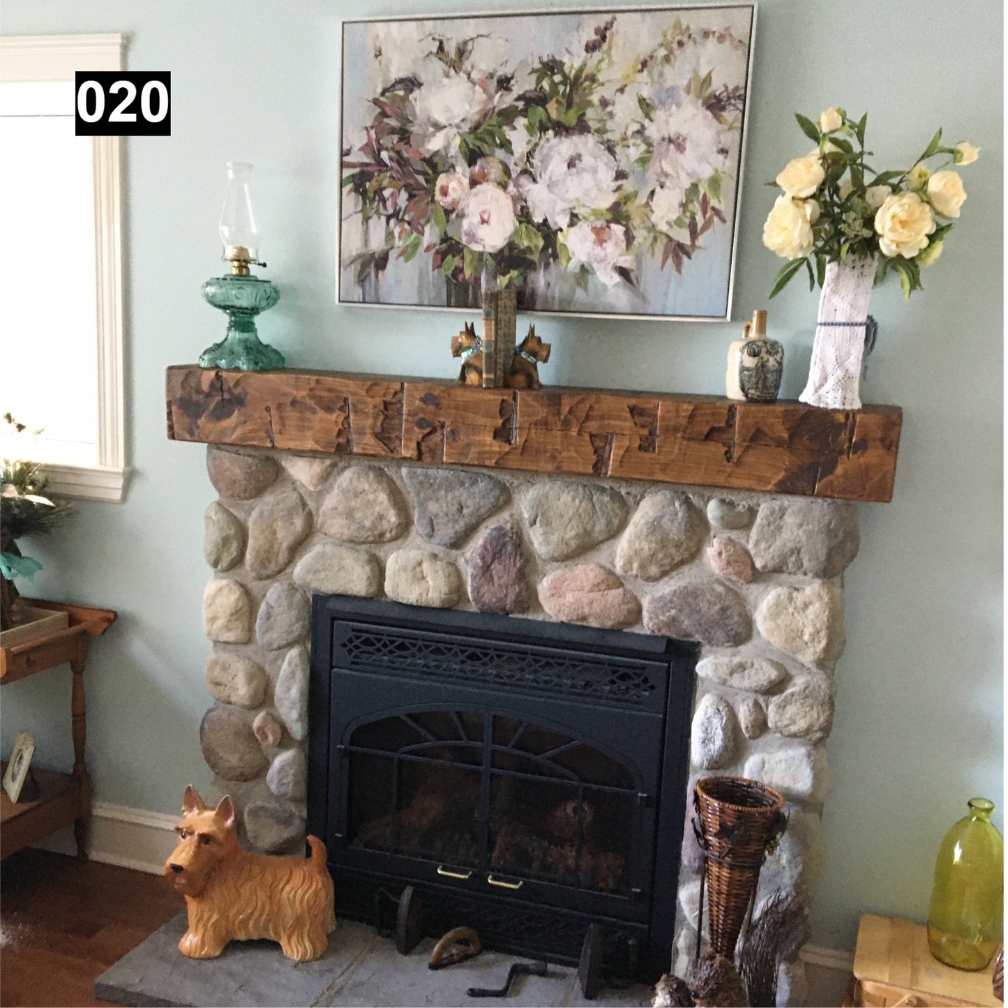 Custom reclaimed wood beam fireplace mantel