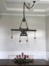 Load image into Gallery viewer, Beautiful hay trolley chandelier with Mason jars
